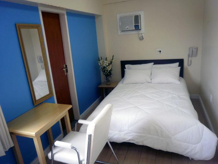 Quarto Duplo com Uma Cama de Casal