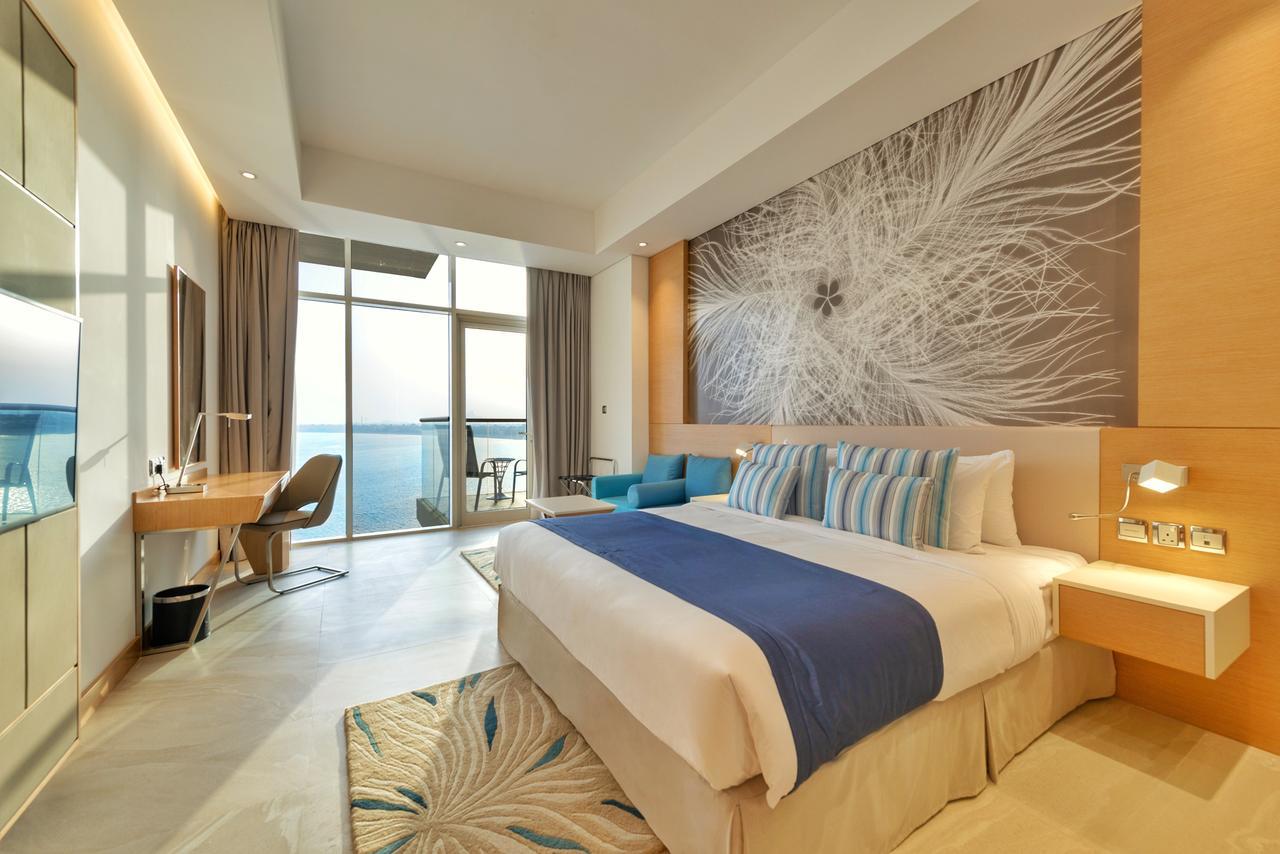 Quarto Premium com Vista Mar e Acesso Privado à Praia do Hotel