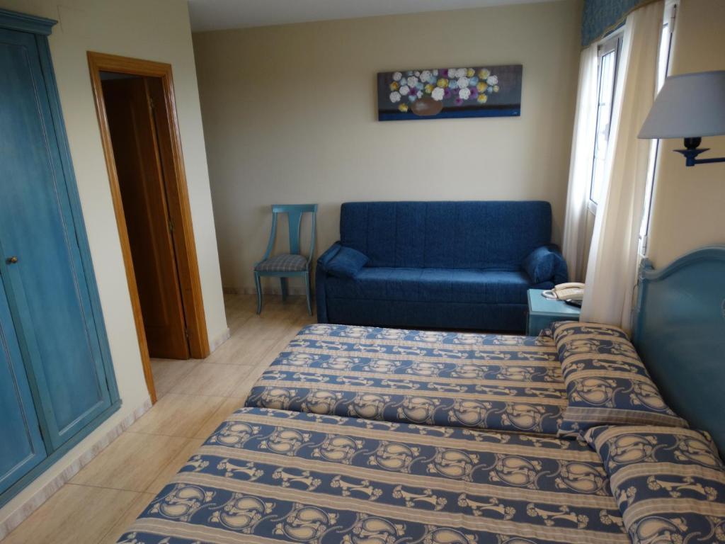 Habitación Doble con cama supletoria - 1 o 2 camas (3 adultos)