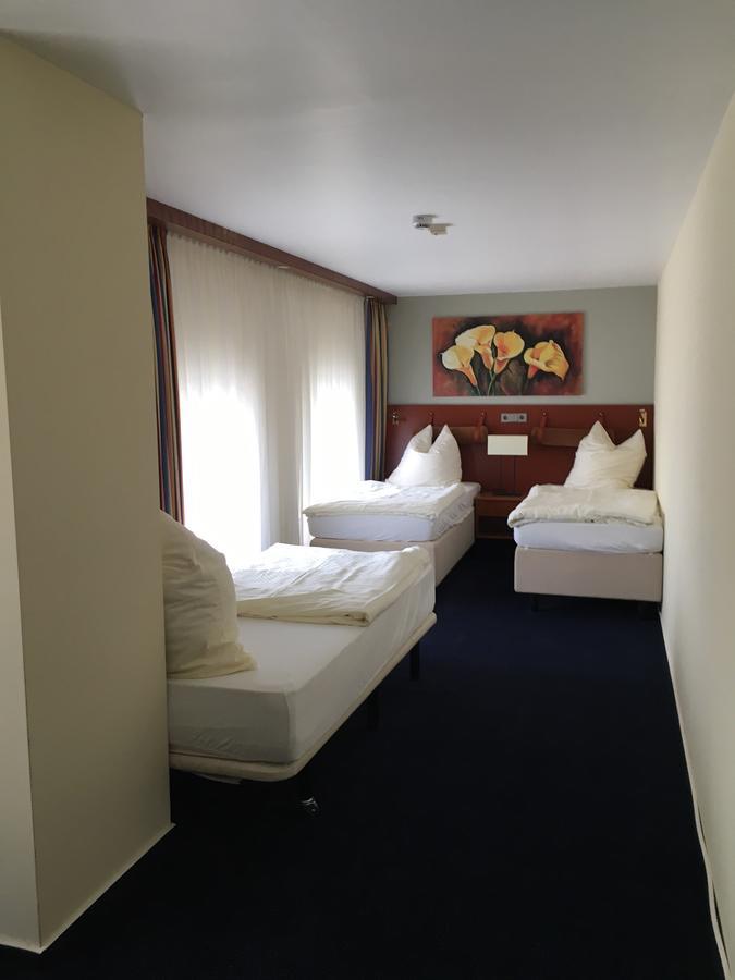 Dreibettzimmer mit eigenem Bad