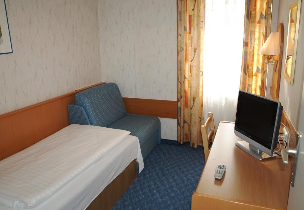 Chambre Simple avec Toilettes Communes