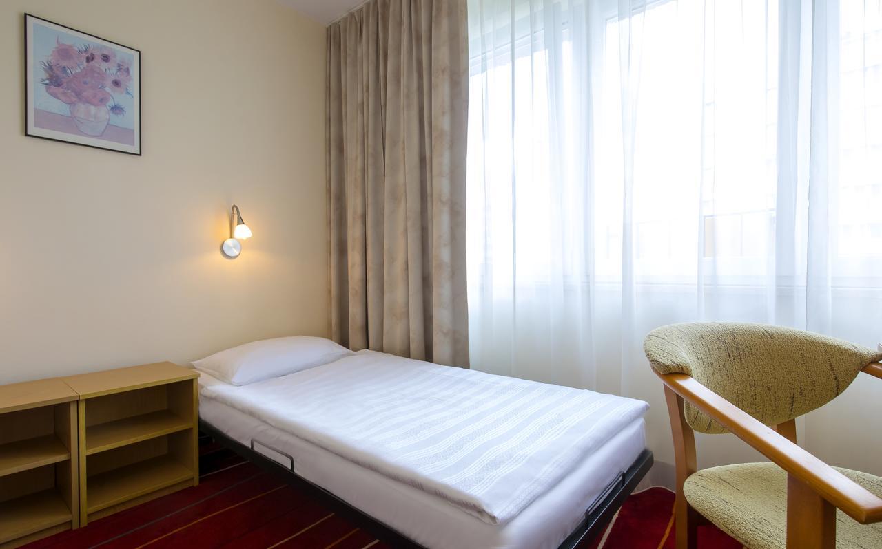 Chambre Triple (1 Adulte)