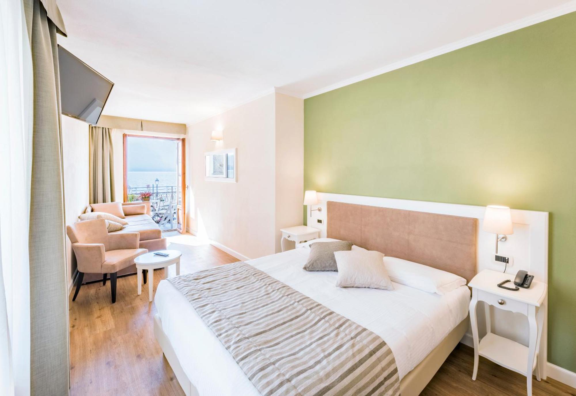 Chambre Triple avec Balcon et Vue sur le Lac