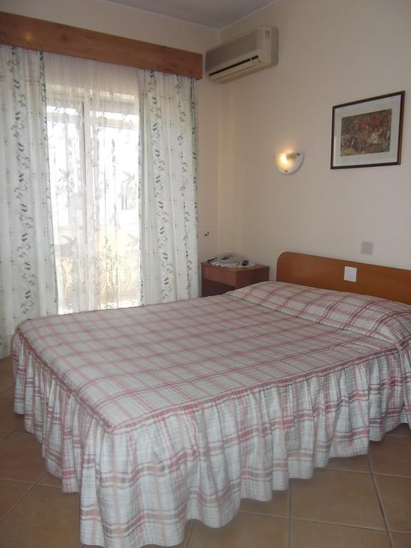 Quarto Triplo com Varanda