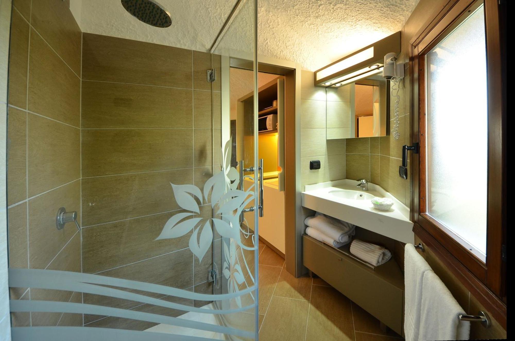 Bungalow con Vista Mare (2 Adulti + 2 Bambini)