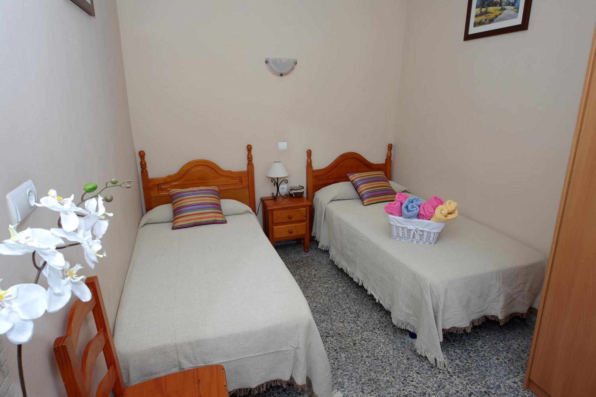 Quarto Individual com Casa de Banho Partilhada