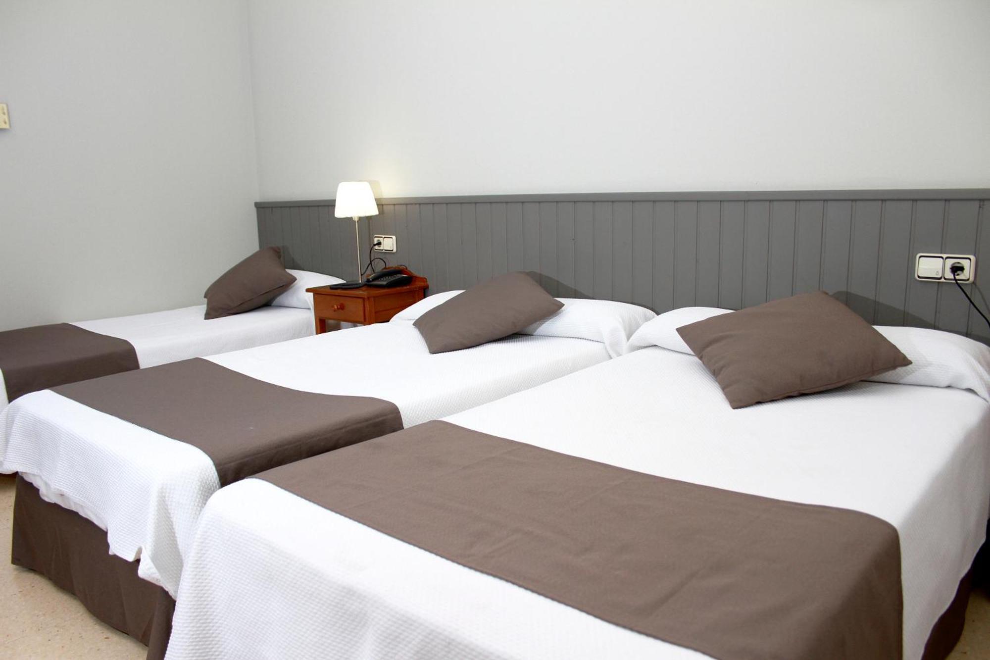 Habitación Doble con cama supletoria (2 adultos + 1 niño) - 2 camas