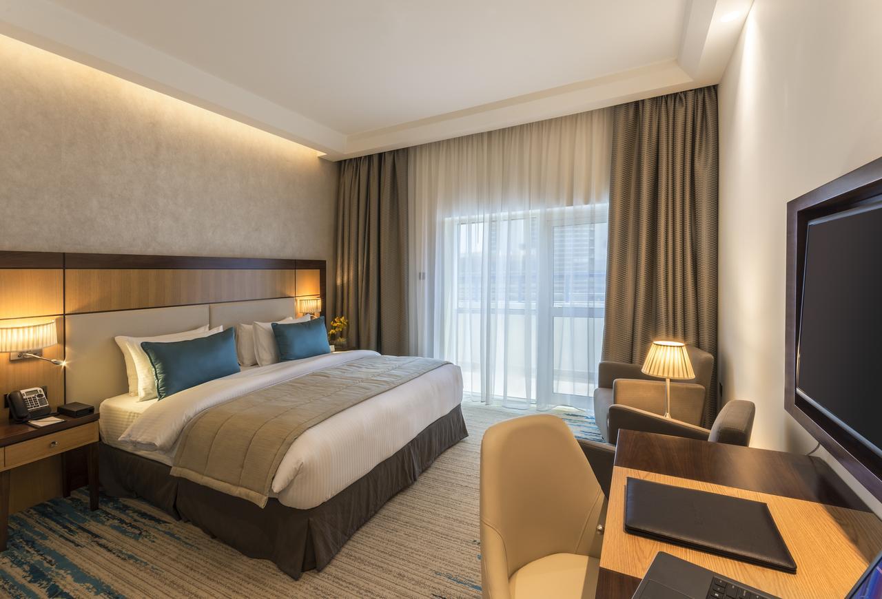 Habitación Deluxe King (traslados gratuitos a la playa y centros comerciales seleccionados y 20% de descuento en comida, bebida y Spa) - 1 cama extragrande