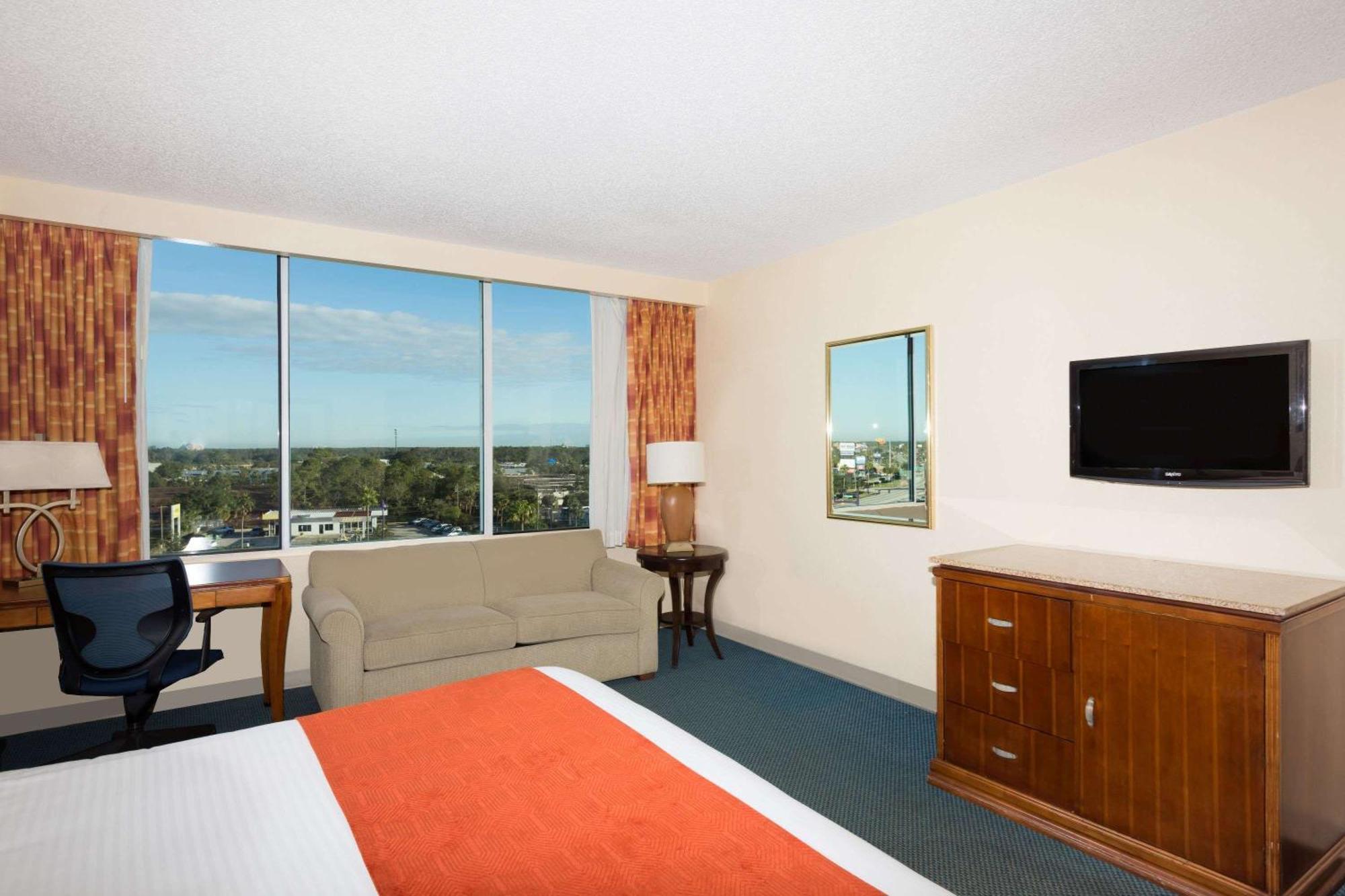 Quarto Deluxe Tower com Cama King-size e Sofá-cama