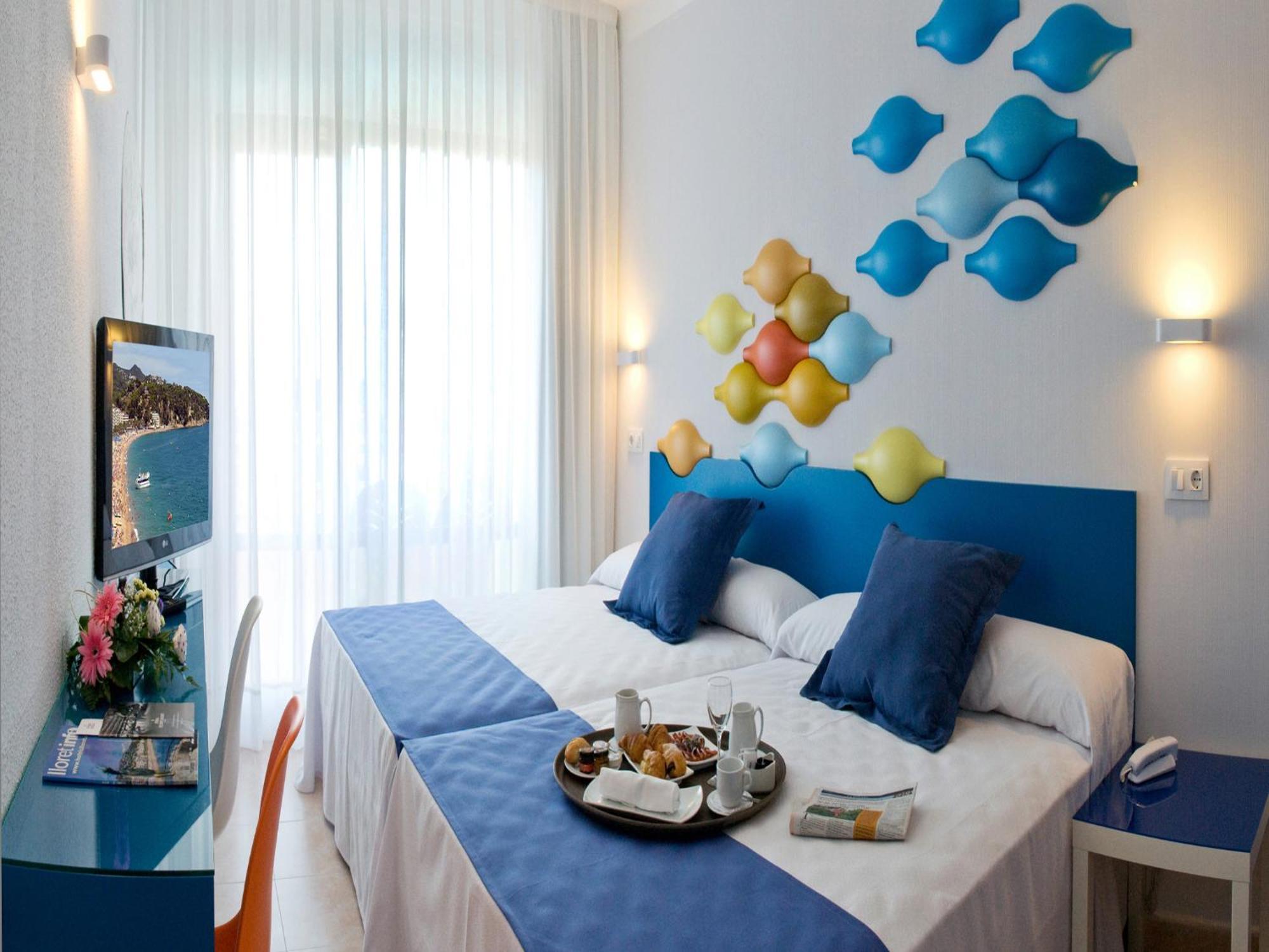 Habitación Doble (2 adultos + 1 niño) - 1 o 2 camas