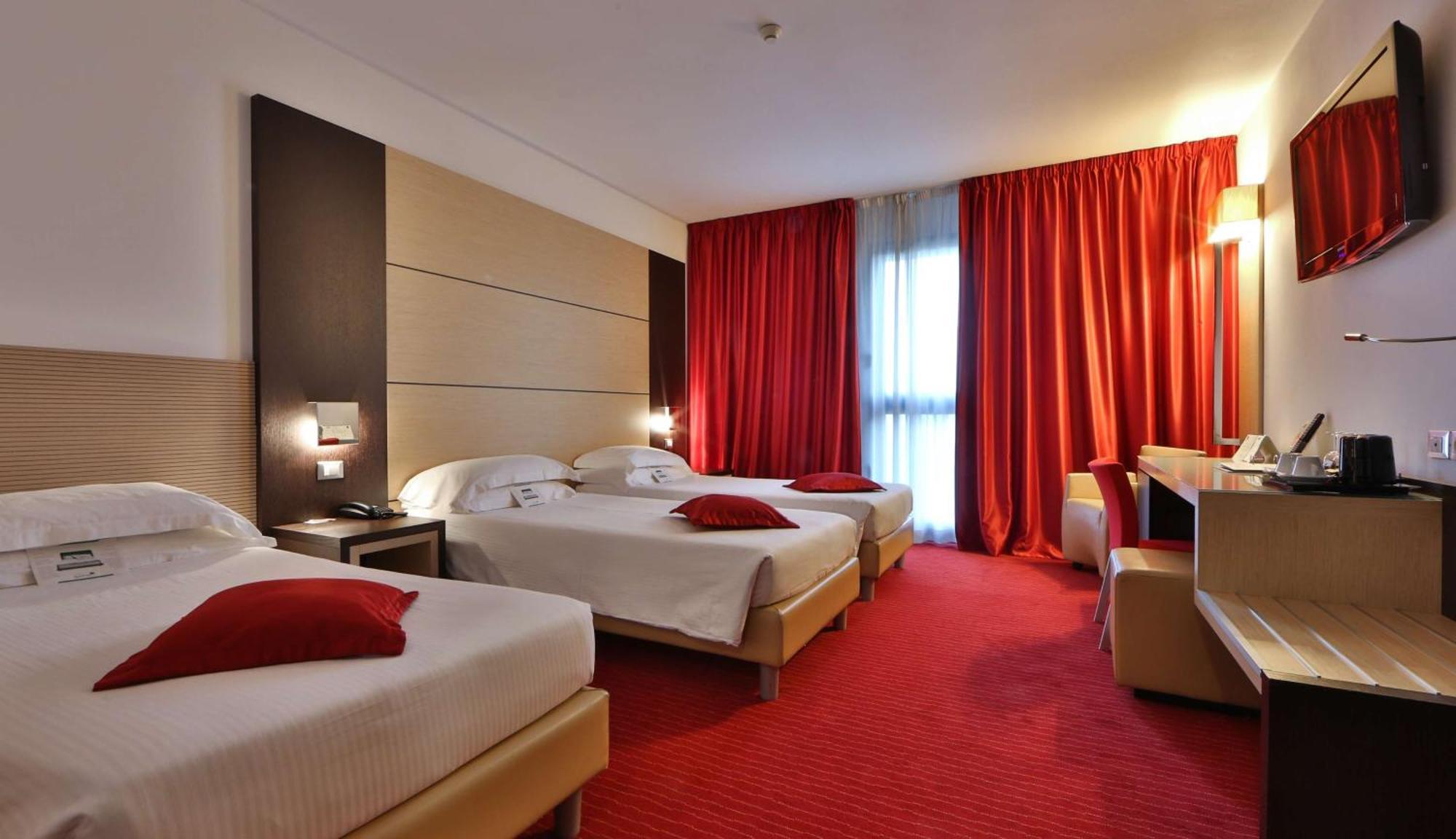 Camera Queen Comfort con Letto Singolo Supplementare