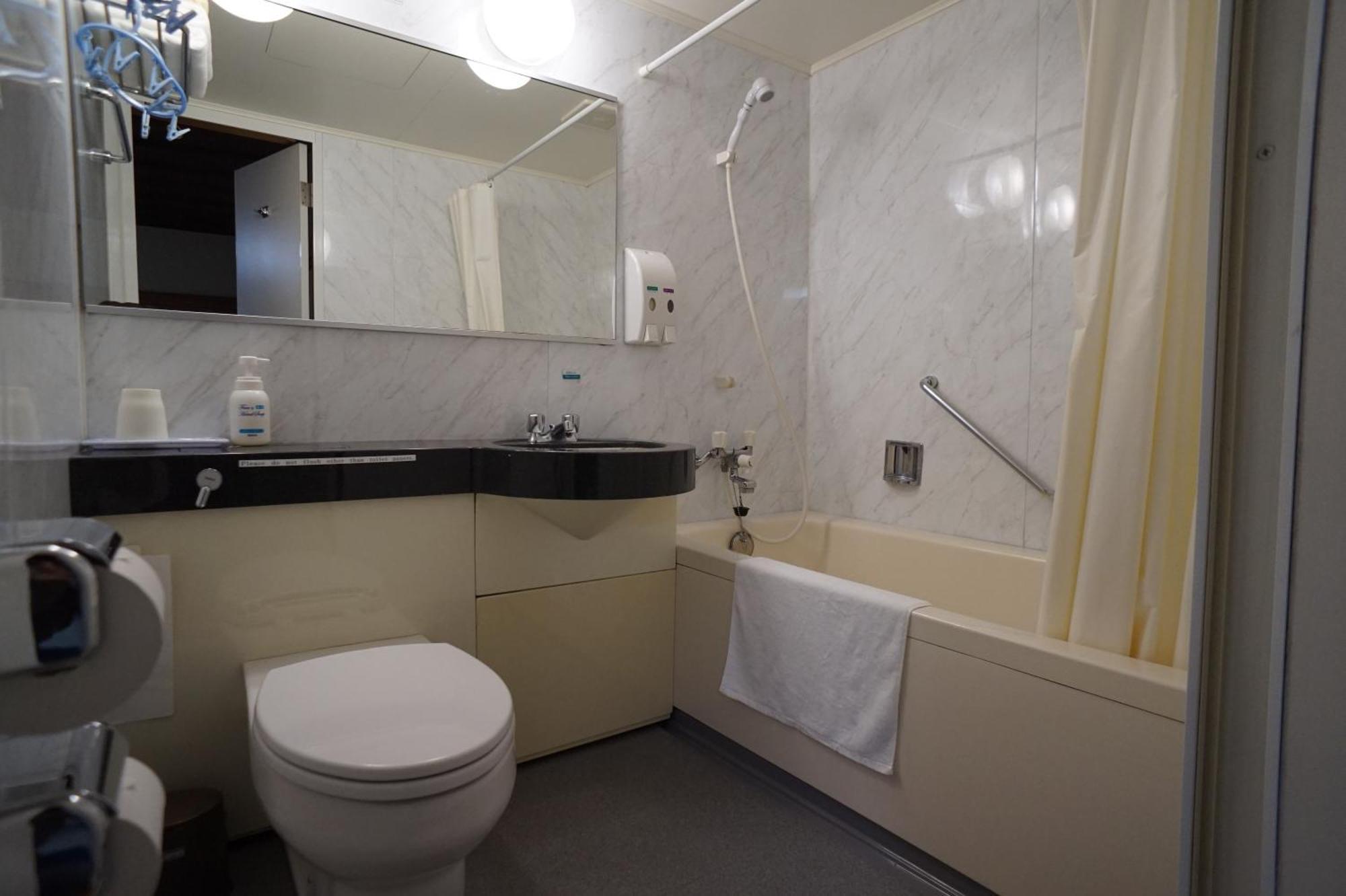 Chambre Quadruple avec Salle de Bains