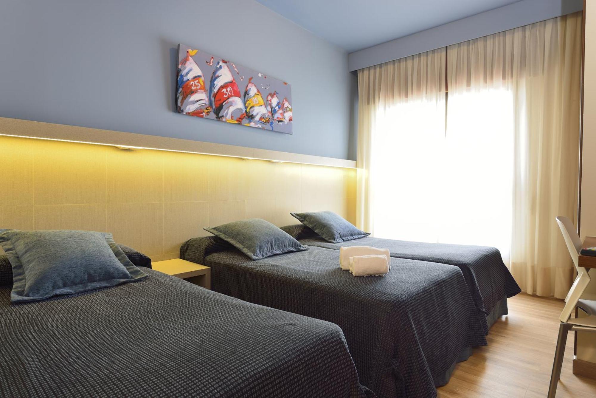Habitación Doble con cama supletoria - 1 o 2 camas (2 adultos + 1 niño)