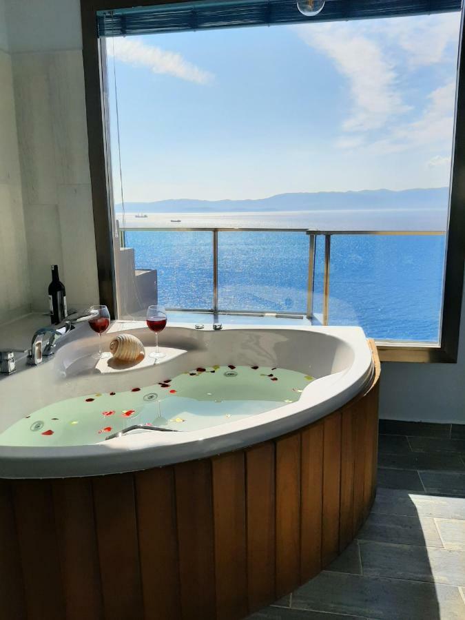 Kamer met Kingsize Bed en Uitzicht op Zee