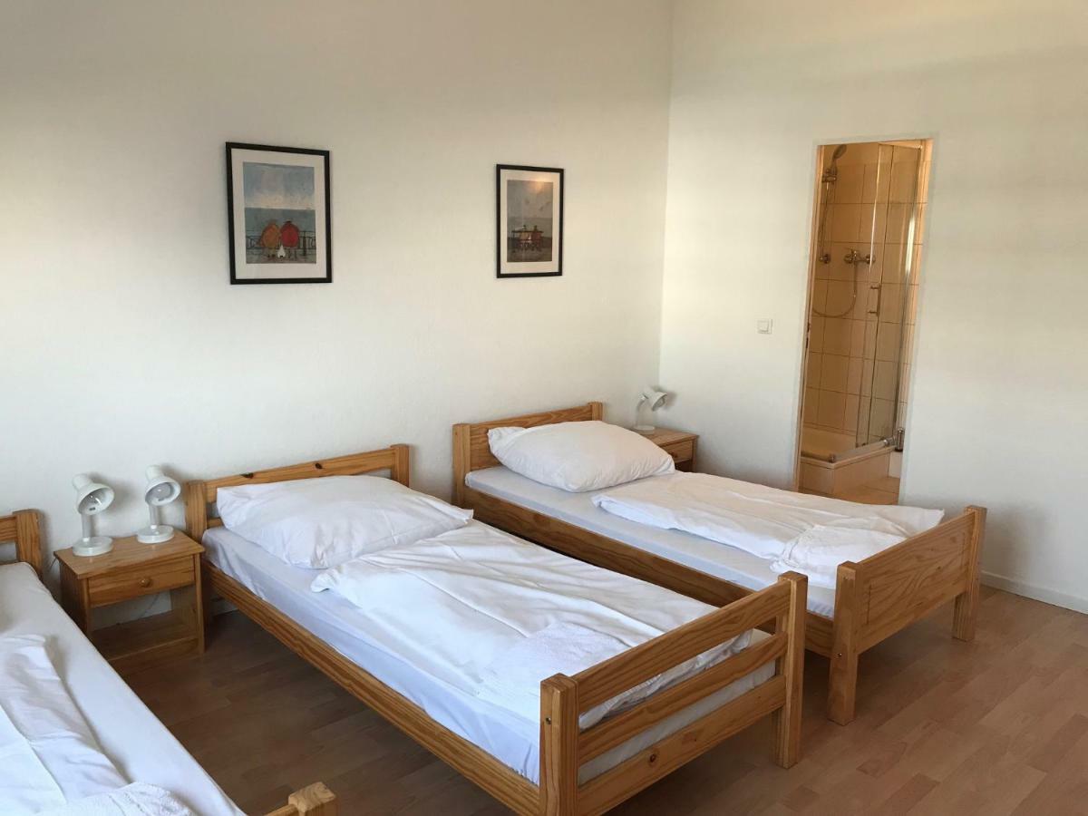 Dreibettzimmer mit Gemeinschaftsküche