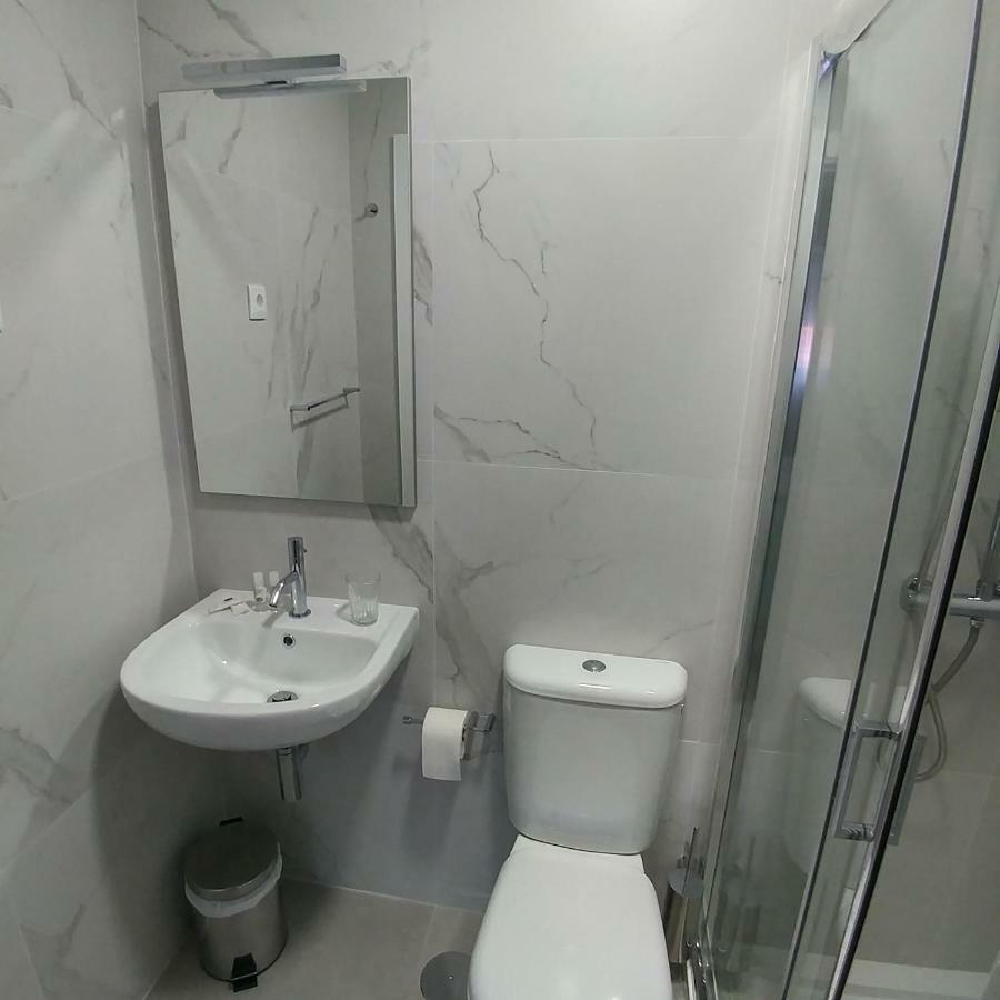 Quarto Quádruplo com Varanda