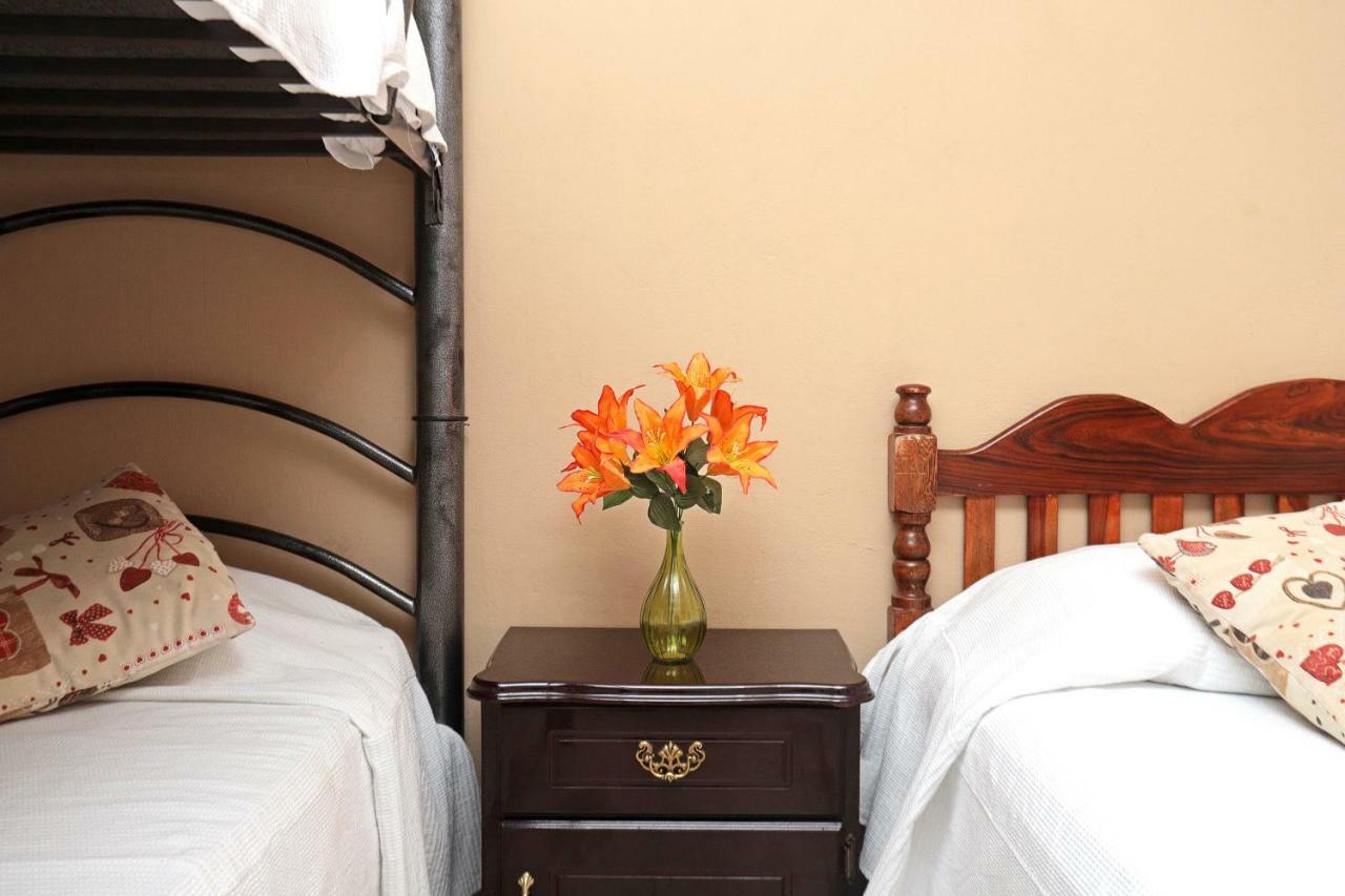 Chambre Quadruple avec Salle de Bains Privative