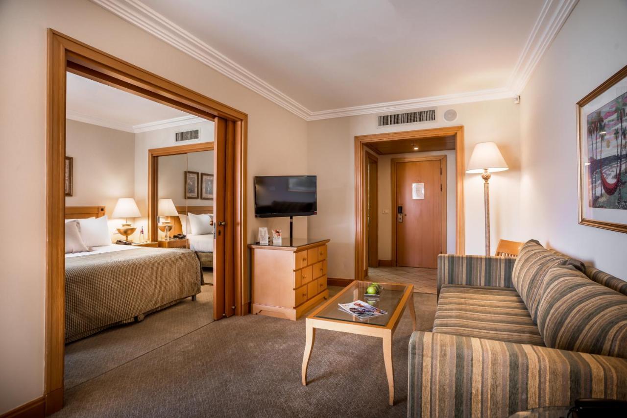 Deluxe One Bedroom Suite with Pool View and Balcony