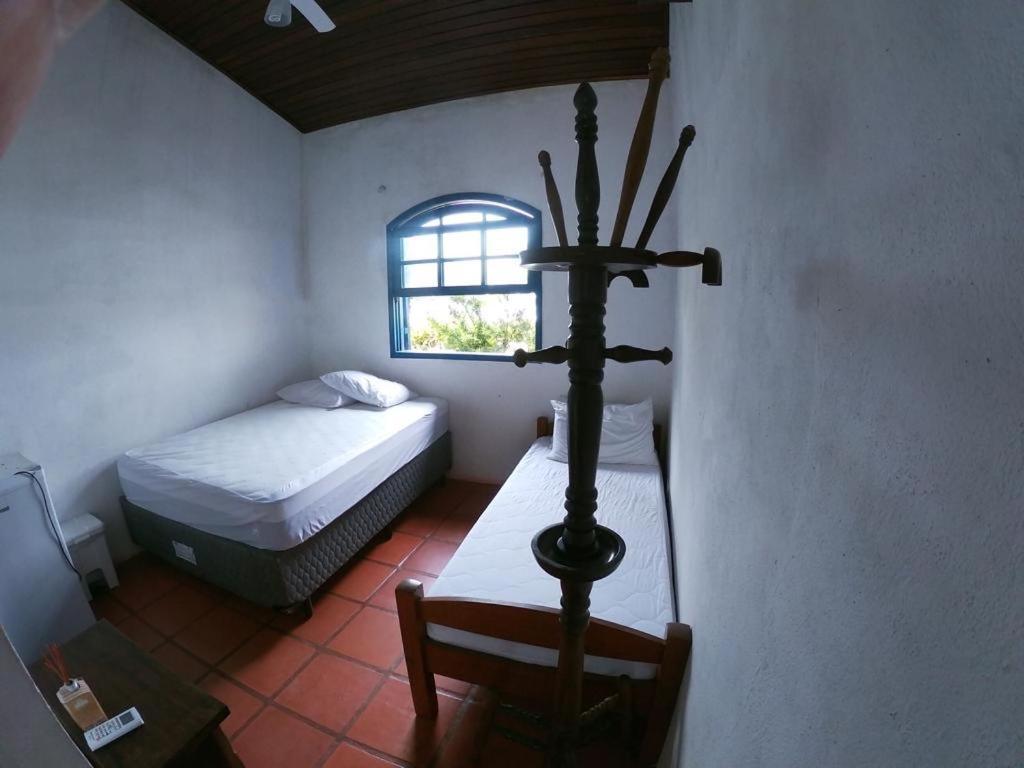 Quarto Triplo com Vista do Mar