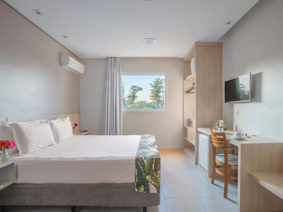 Quarto com Cama Queen-size