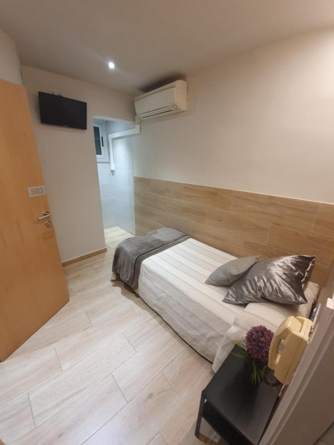 Camera Singola con Bagno in Comune