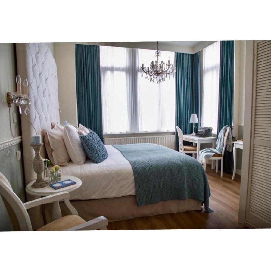Kamer met Kingsize Bed en Uitzicht op de Tuin