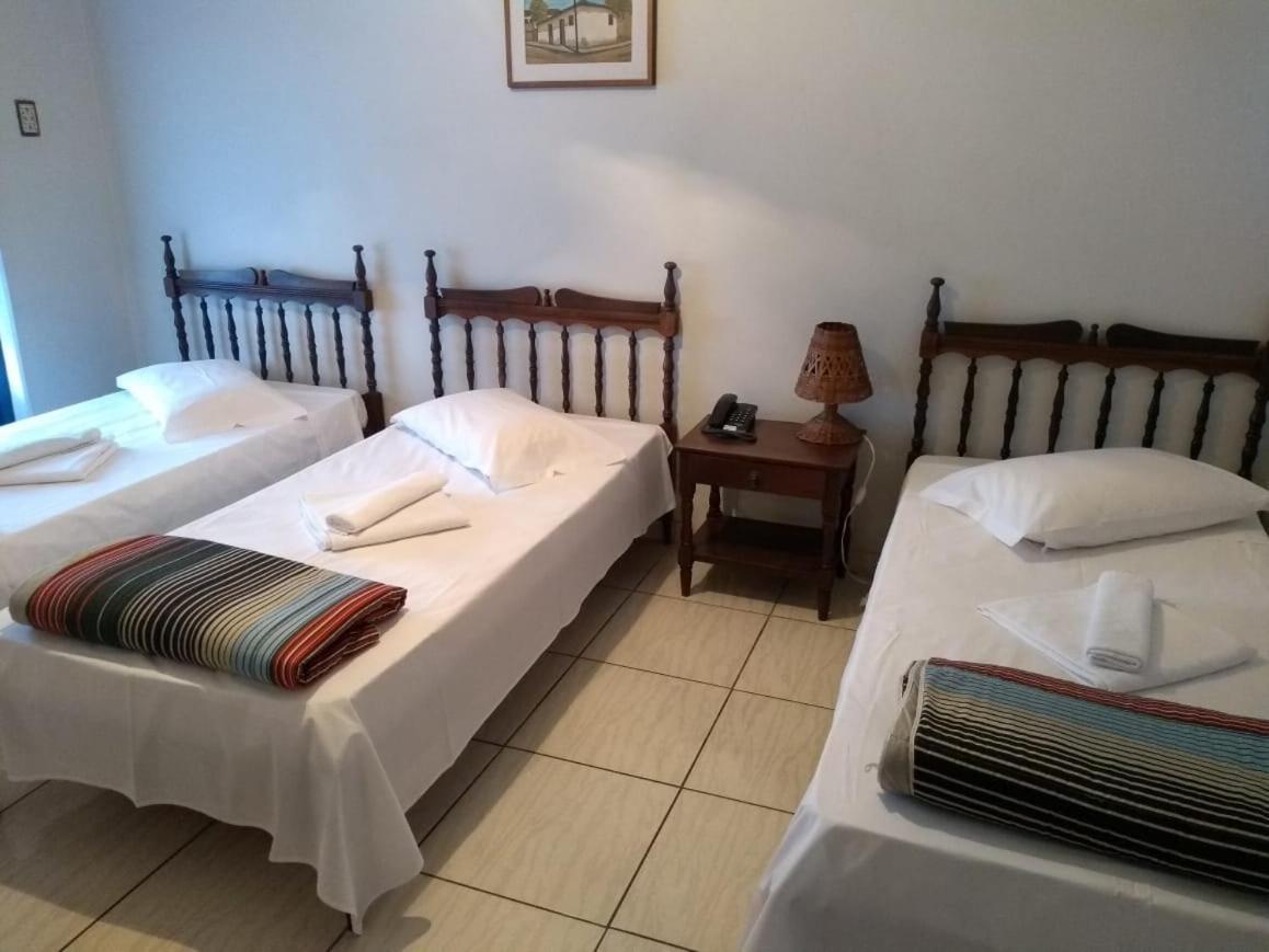Quarto Triplo com Banheiro