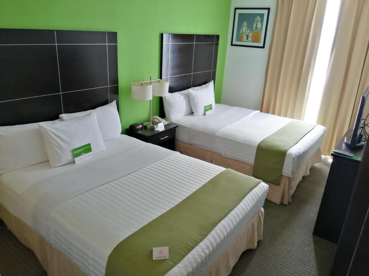 Habitación Doble Deluxe con 2 camas dobles - Adaptada para personas de movilidad reducida - No fumadores