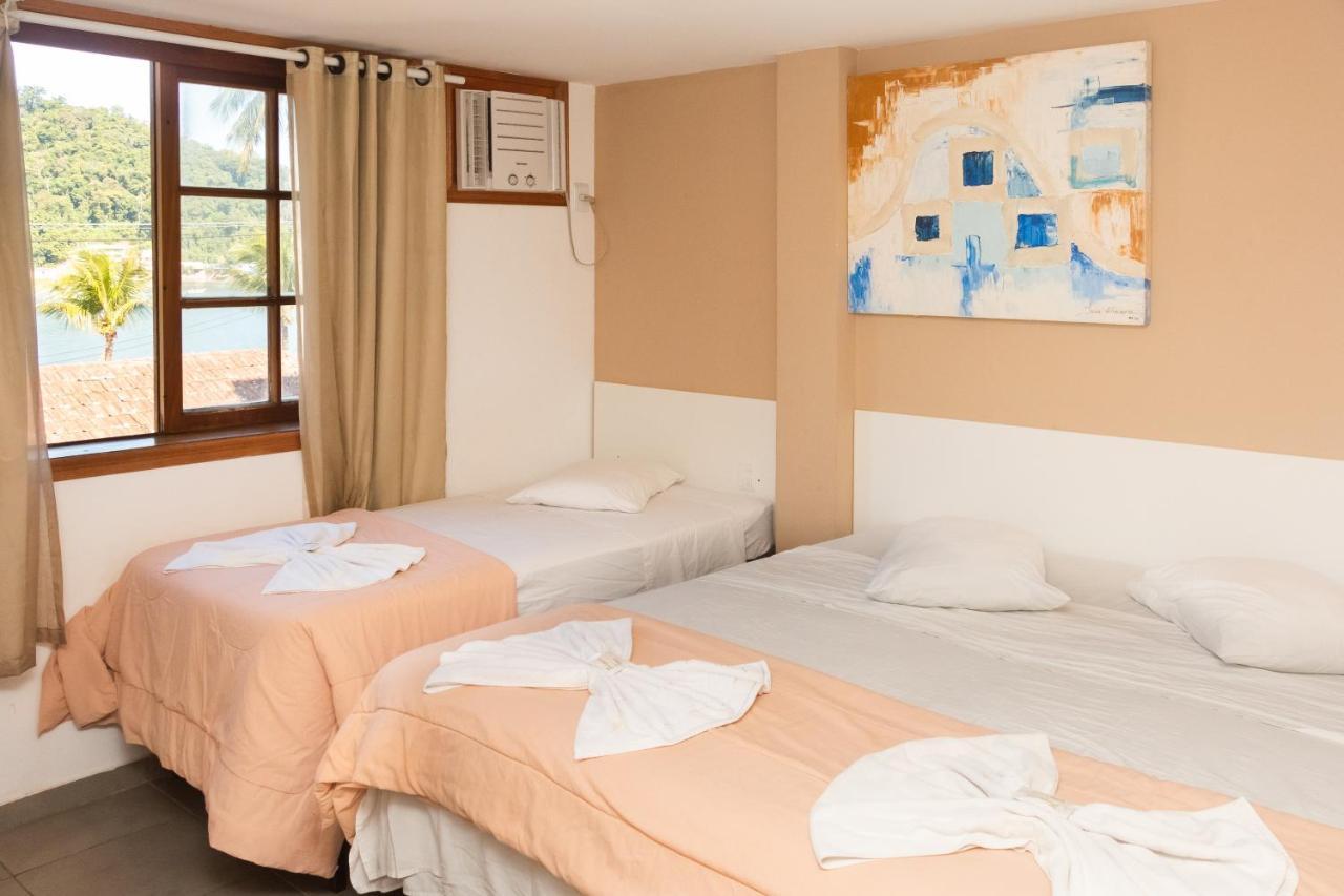 Quarto Triplo com Vista do Mar