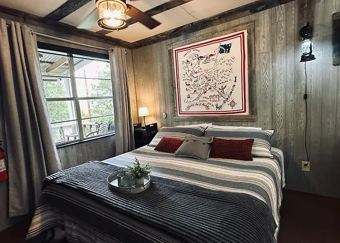 Acorn Hideaways Canton Gold Panner Bunkhouse King Bed