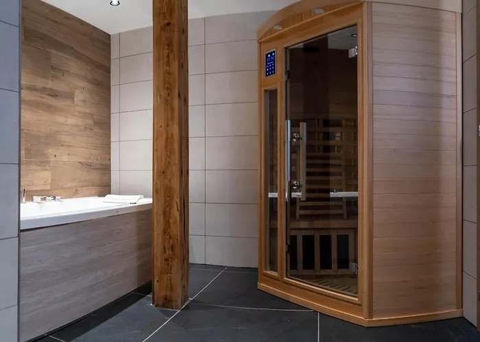 Géraniums Et Neige Fraîche, Demeure de prestige avec suites appartements, chambre tout confort, certaines avec spa et sauna privatifs au cœur du Jura à Métabief dans le Haut-Doubs